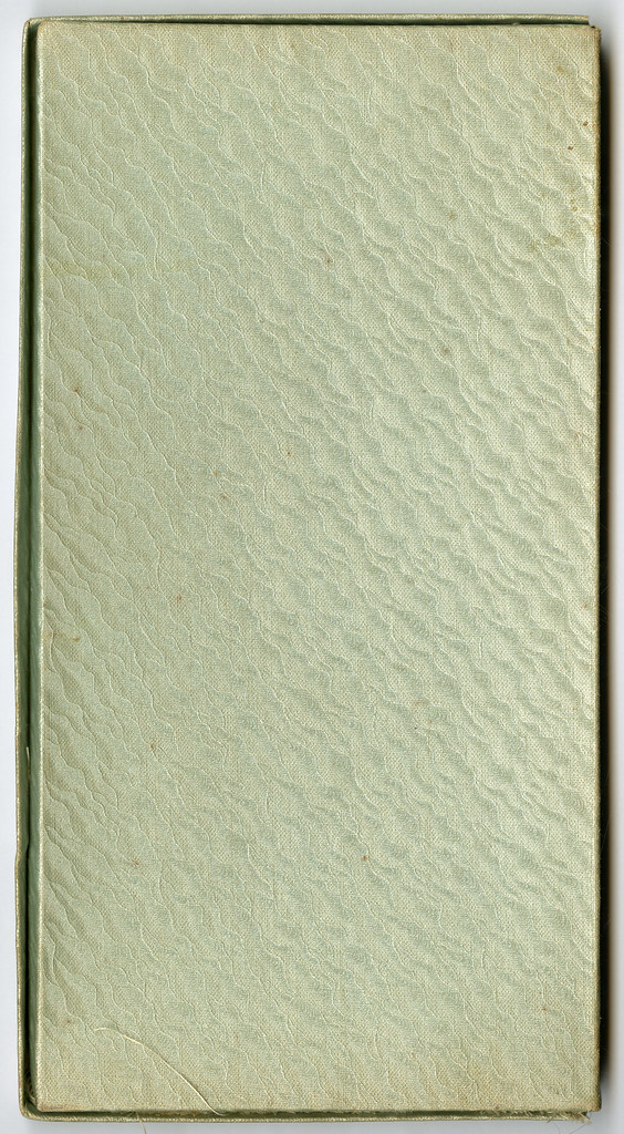 Close-up of the textured cover of a closed book